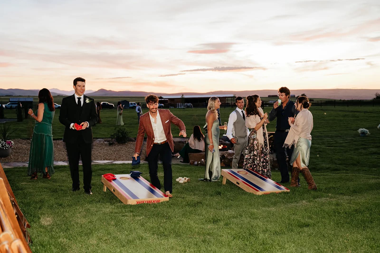 Corporate retreat guests playing outdoor games at a Montana ranch venue